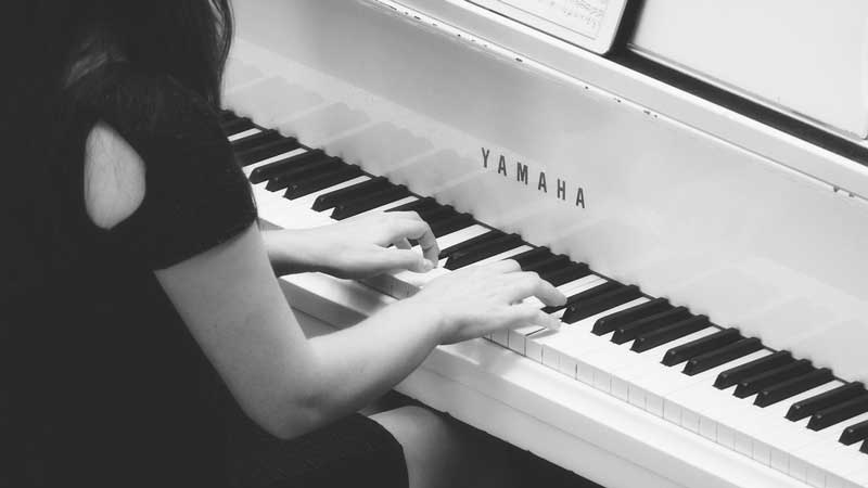 Older child playing the piano